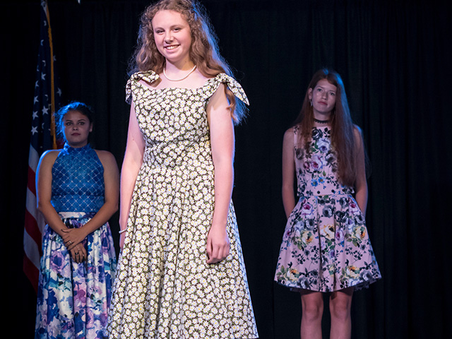 Girl in a home made dress
