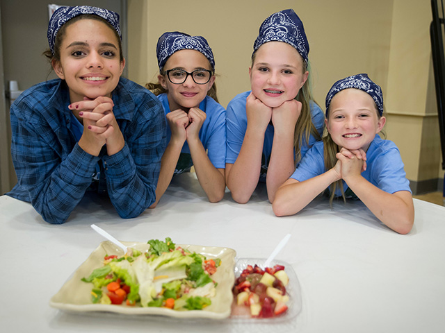 Girls showing their food in food showdown