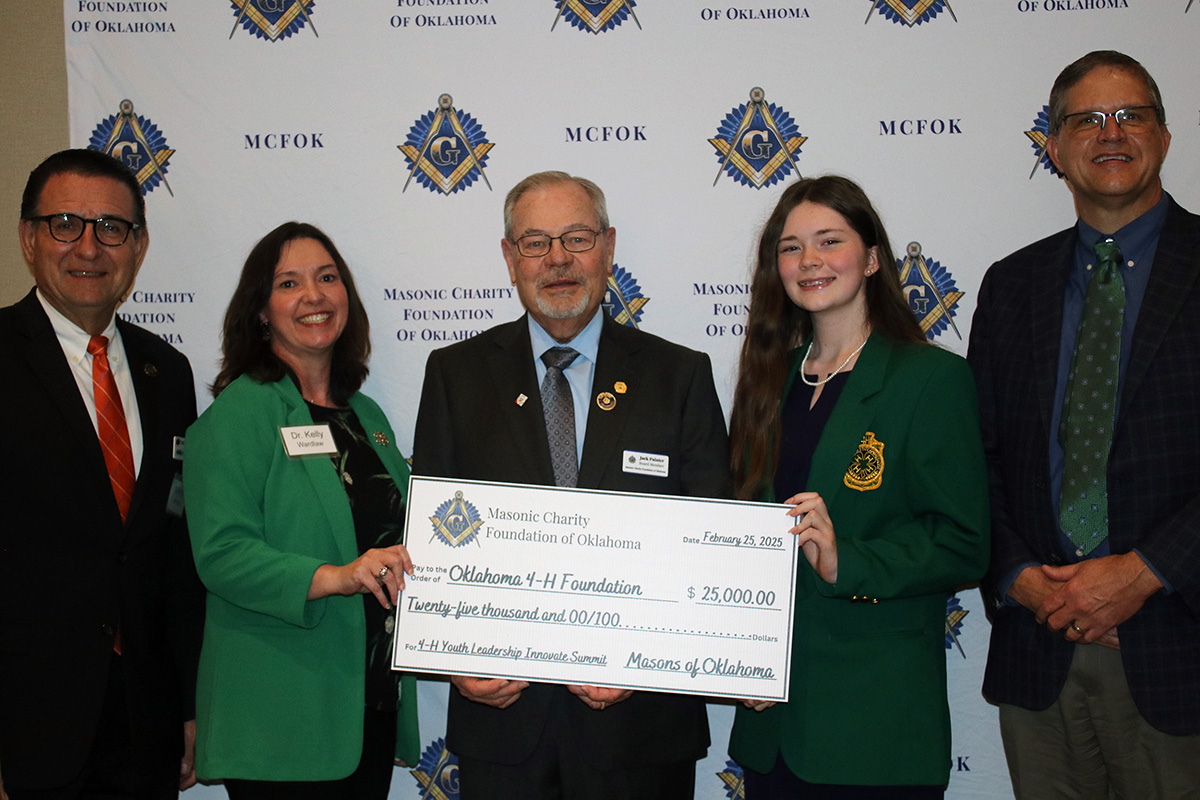 Oklahoma 4-H representatives accept a check from the Masonic Charity Foundation of Oklahoma.